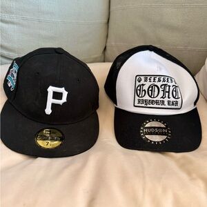 Two Black Fitted Caps. Both for $18.